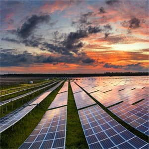 Rows of solar panels with clouds and sunset Rows of solar panels with clouds and sunset