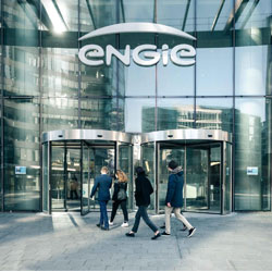 Engie employees at the entrance of company building Engie employees at the entrance of company building