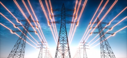 Picture looking up at power lines with electric orange surrounding the lines