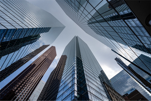 Looking up at skyscrapers
