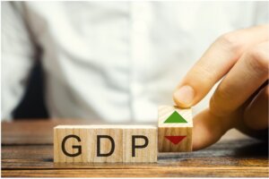 Letter blocks of "GDP" and a block with a green and red arrow