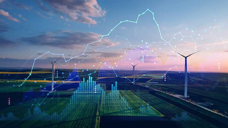Electricity figures against wind turbine background